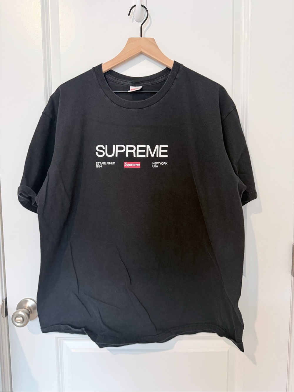 Supreme Black Tee with White Logo and Red Tab